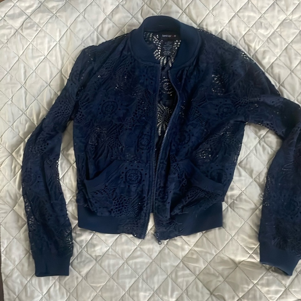 Navy blue lace crocheted zip front jacket..